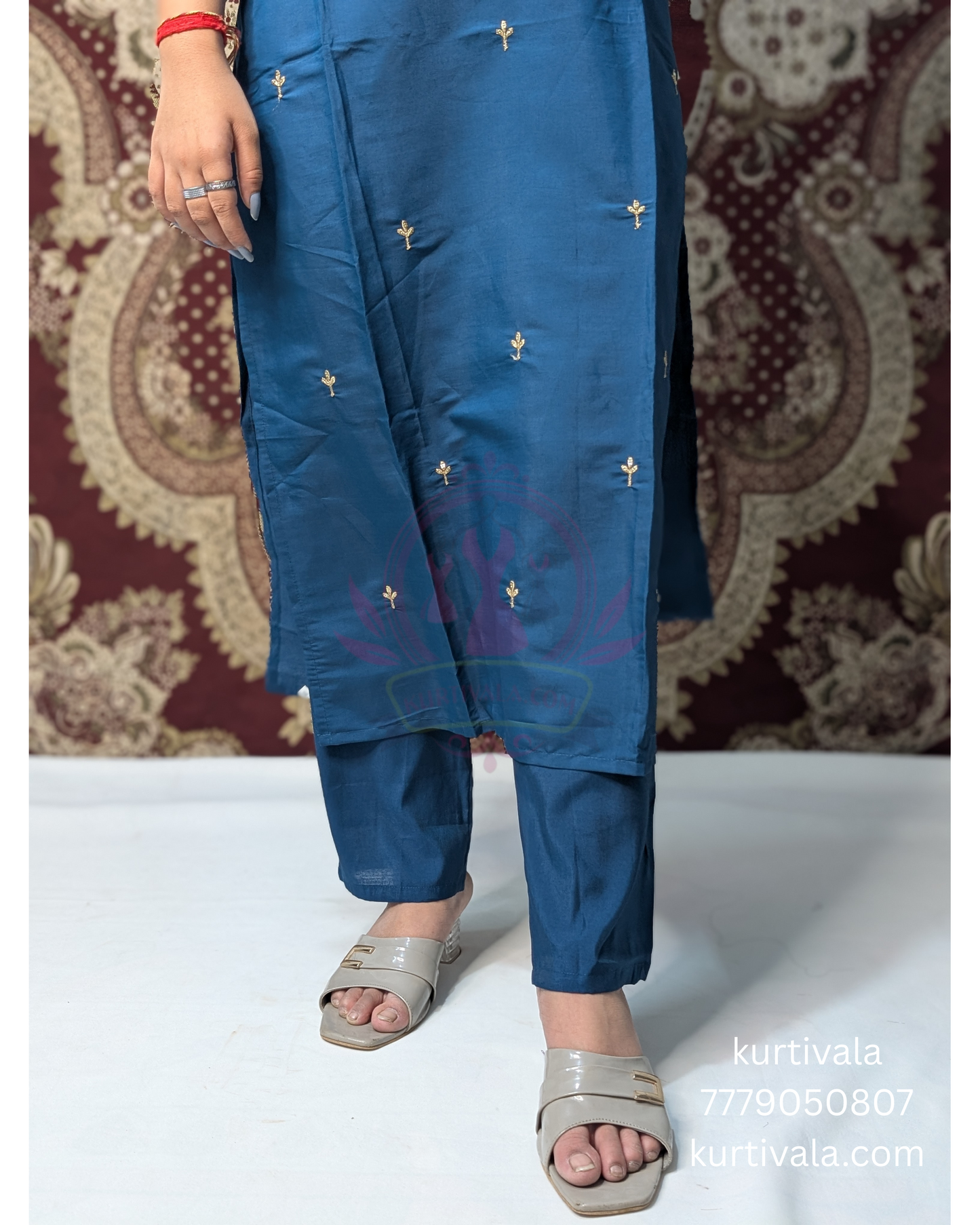 Make a bold style statement with this deep blue kurti set adorned with elegant thread embroidery and subtle embellishments. Paired with a rich multicolor woven dupatta, it’s a perfect blend of tradition and contemporary flair for festive occasions.