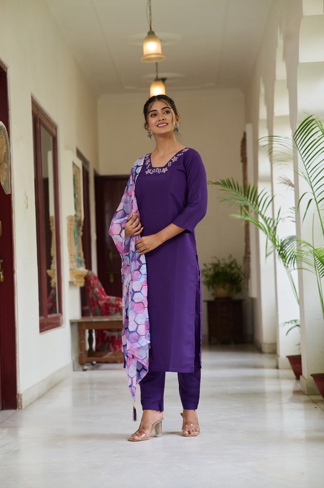 Embrace elegance with this deep purple Kurti set, featuring delicate embroidery on the neckline and a vibrant printed dupatta