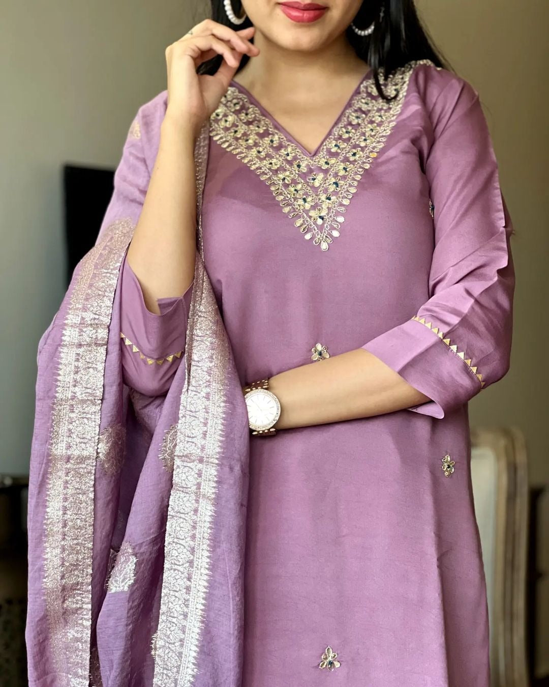 Radiate elegance in this lilac kurti set, adorned with intricate mirror work and delicate embroidery. Paired with a beautifully woven dupatta