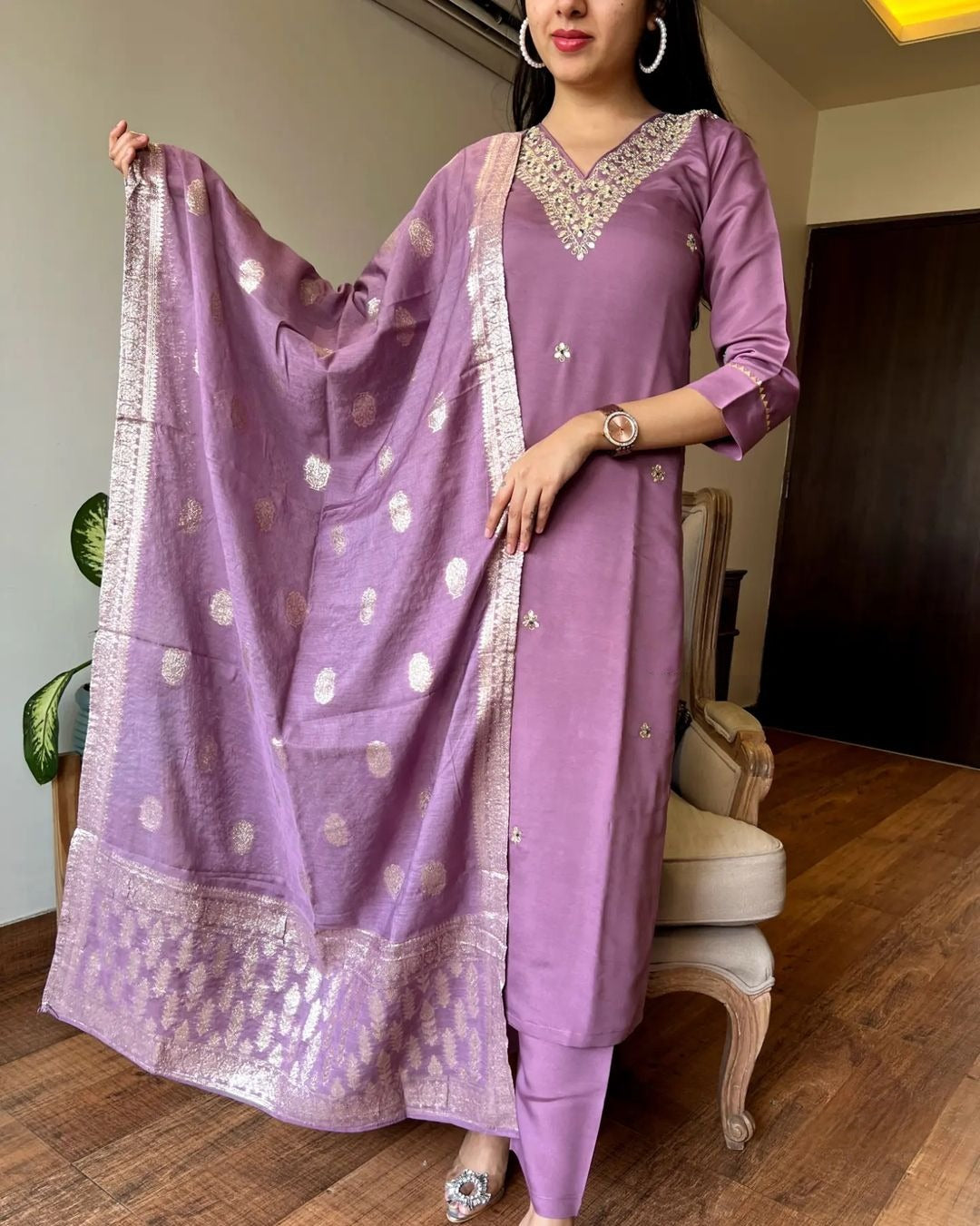 Radiate elegance in this lilac kurti set, adorned with intricate mirror work and delicate embroidery. Paired with a beautifully woven dupatta