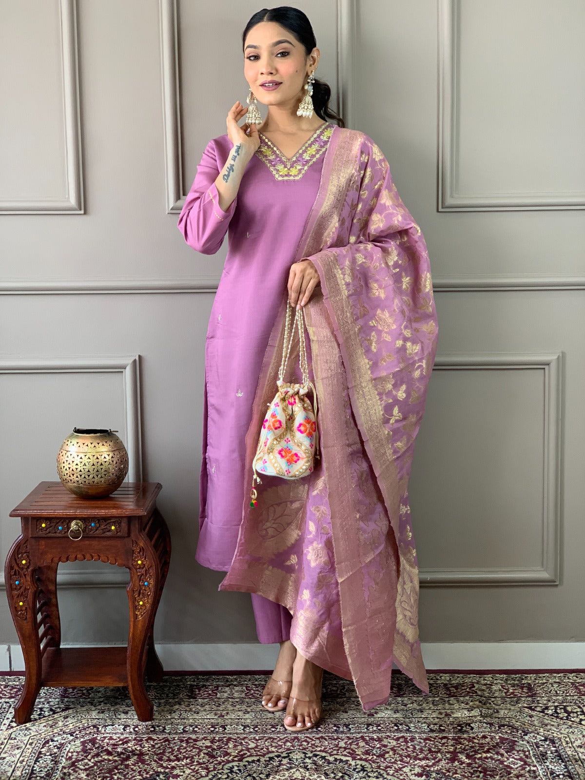 Embrace sophistication with this lime-green kurti set, featuring delicate floral embroidery and a luxurious Banarasi dupatta