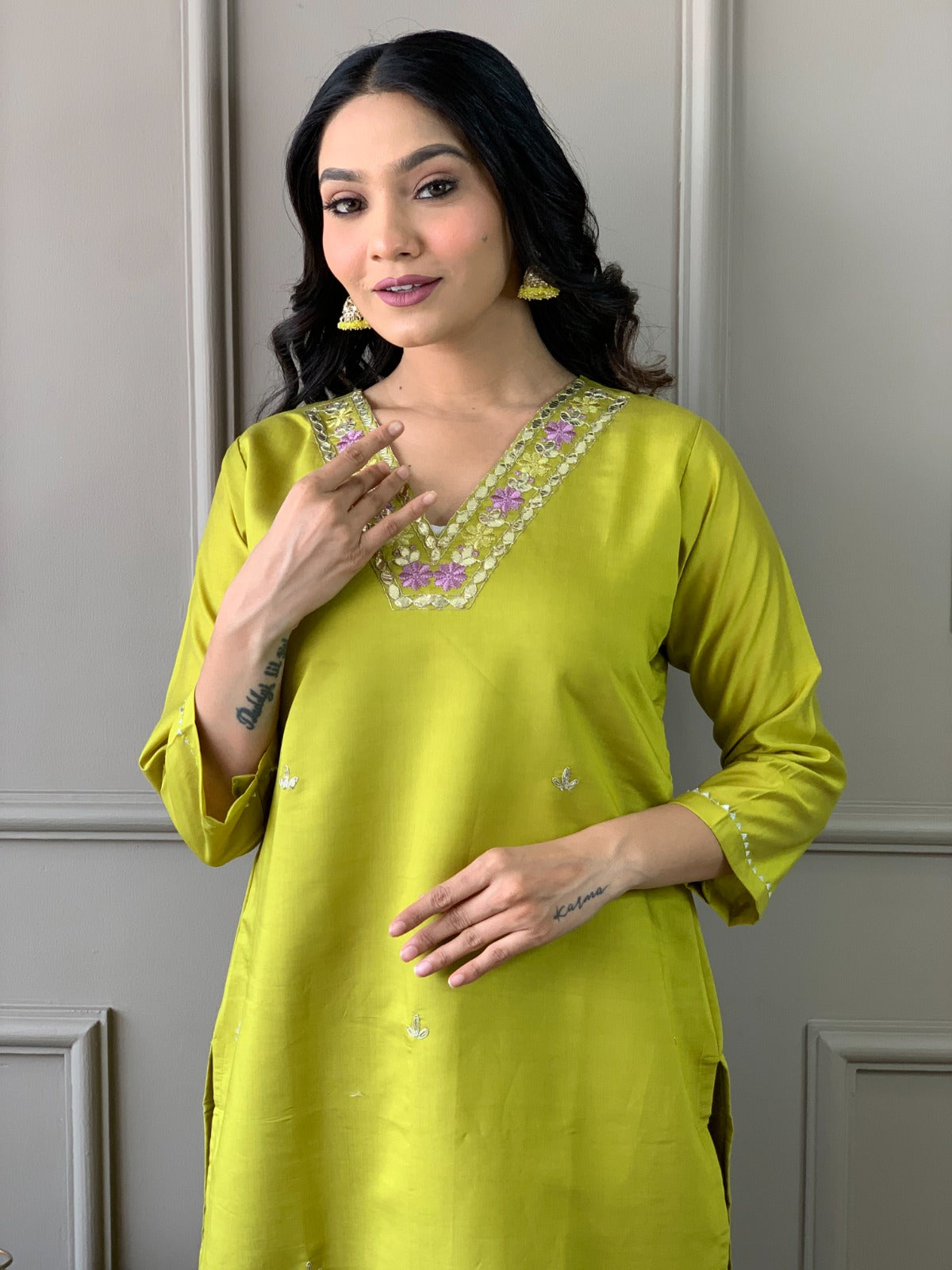 Embrace sophistication with this lime-green kurti set, featuring delicate floral embroidery and a luxurious Banarasi dupatta