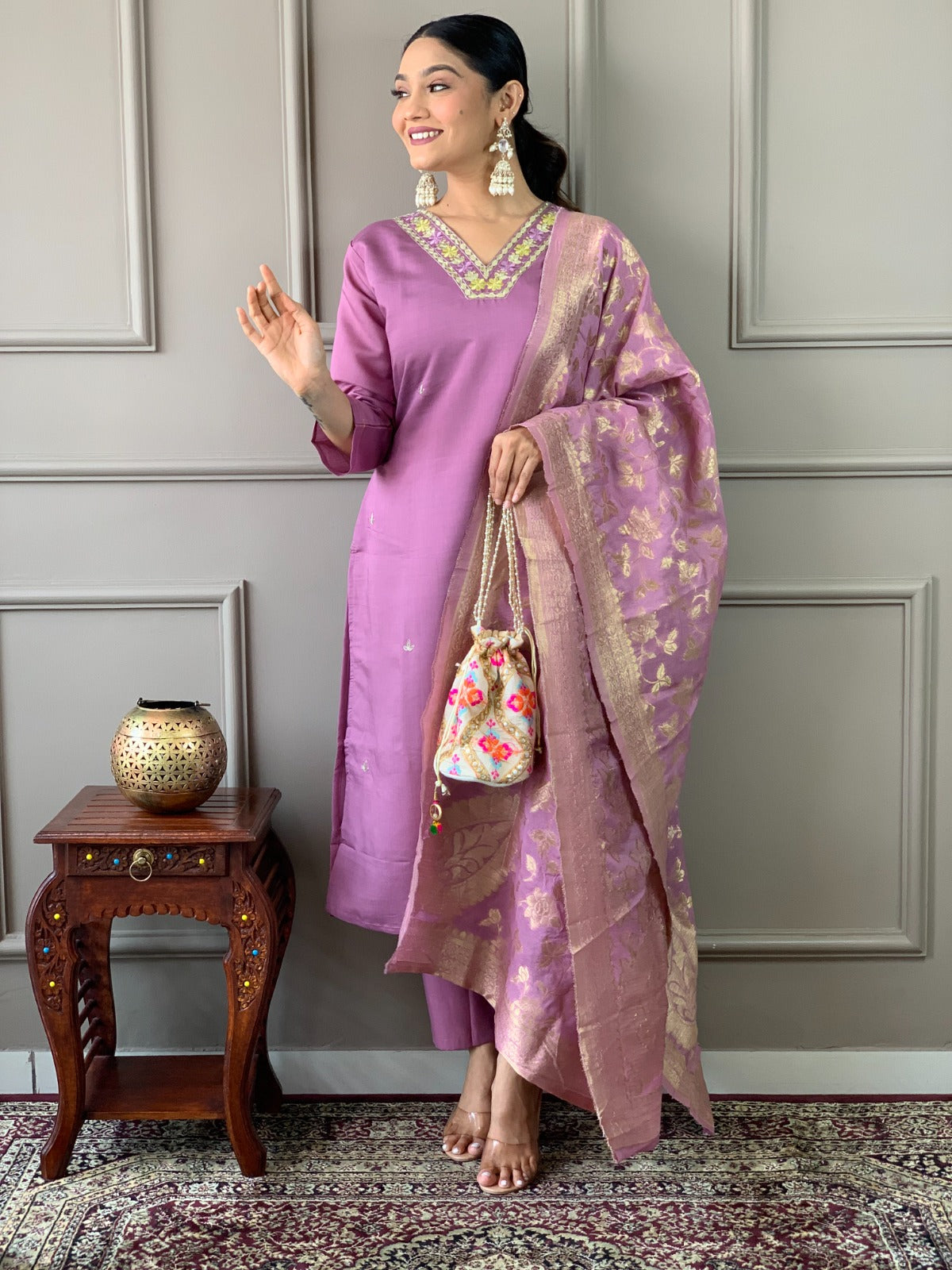 Embrace sophistication with this lime-green kurti set, featuring delicate floral embroidery and a luxurious Banarasi dupatta