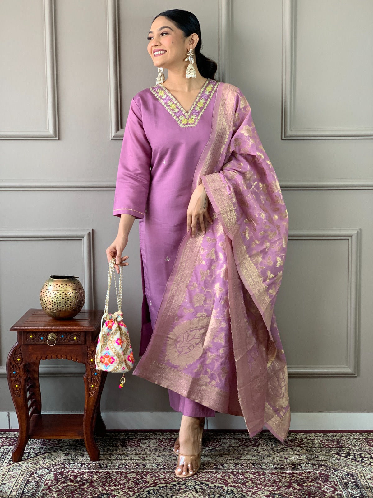 Embrace sophistication with this lime-green kurti set, featuring delicate floral embroidery and a luxurious Banarasi dupatta