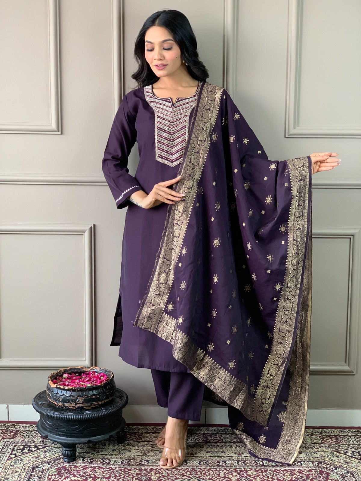 Exude elegance in this deep plum kurti set, featuring exquisite embroidery and a rich gold-detailed dupatta