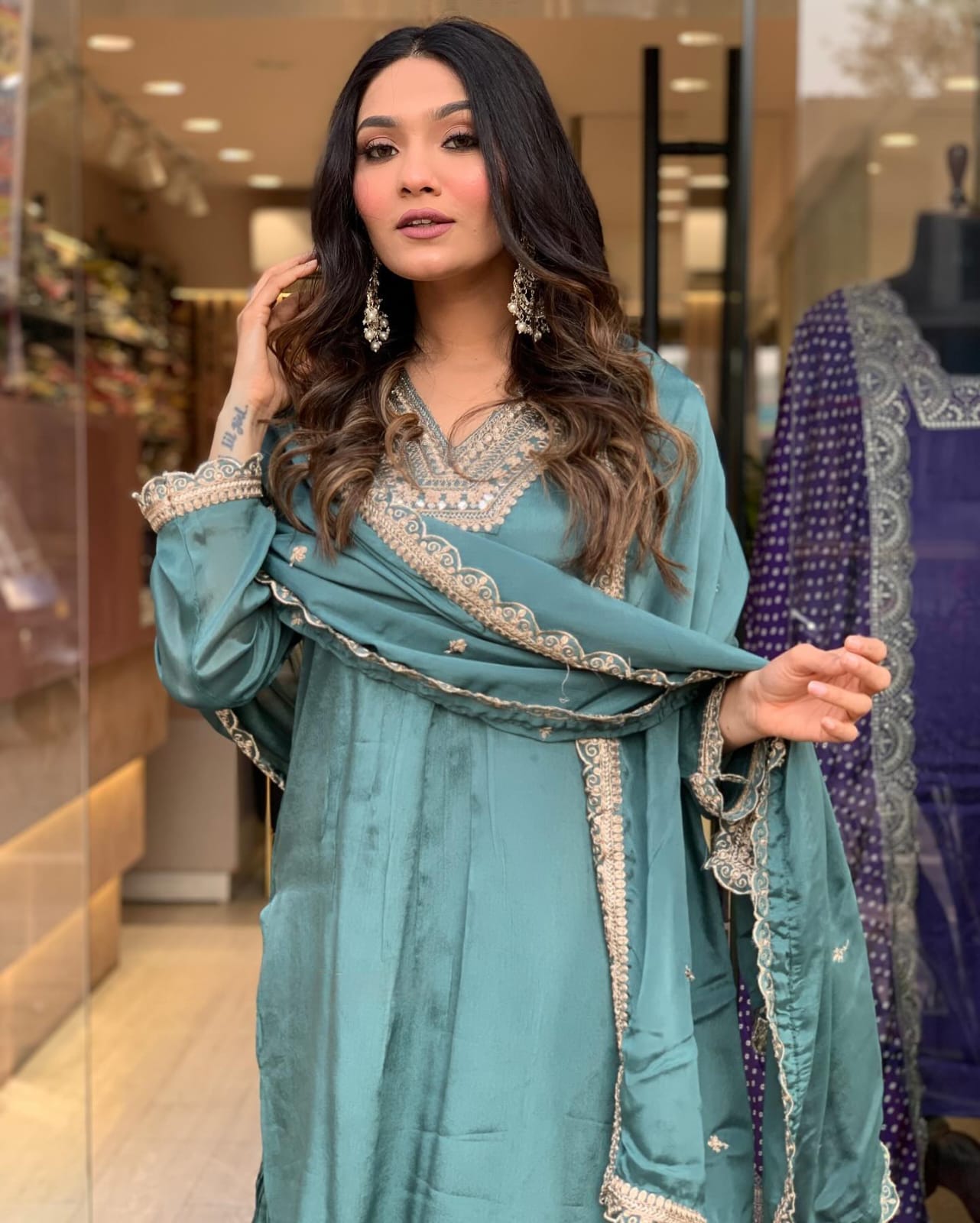 Elevate your style with this elegant teal kurti set, featuring intricate embroidery, delicate lacework, and a flowy silhouette
