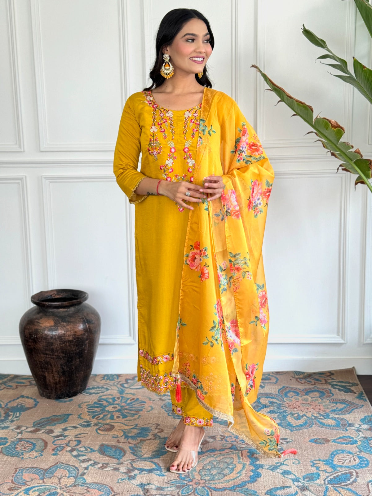Elevate your style with this vibrant mustard yellow kurti set, adorned with intricate floral embroidery and a beautifully printed dupatta