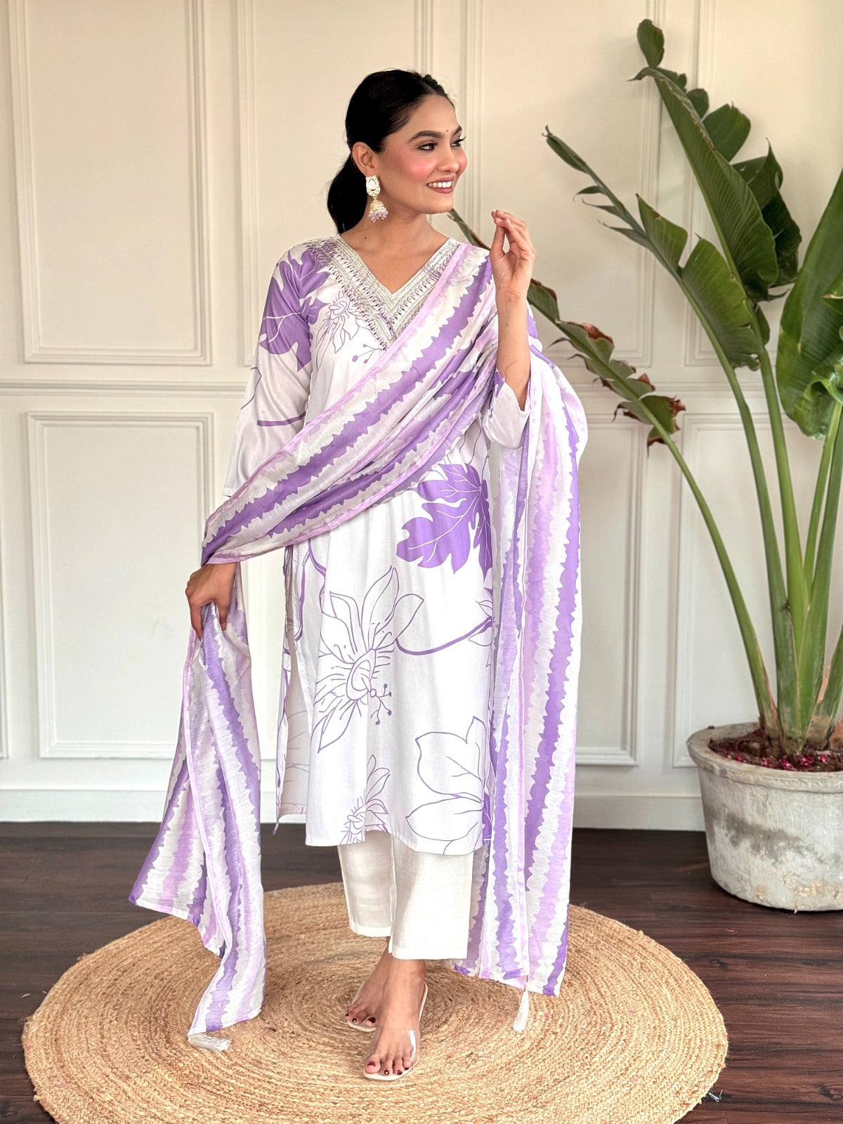 Step into effortless elegance with this soft lavender and white kurti set