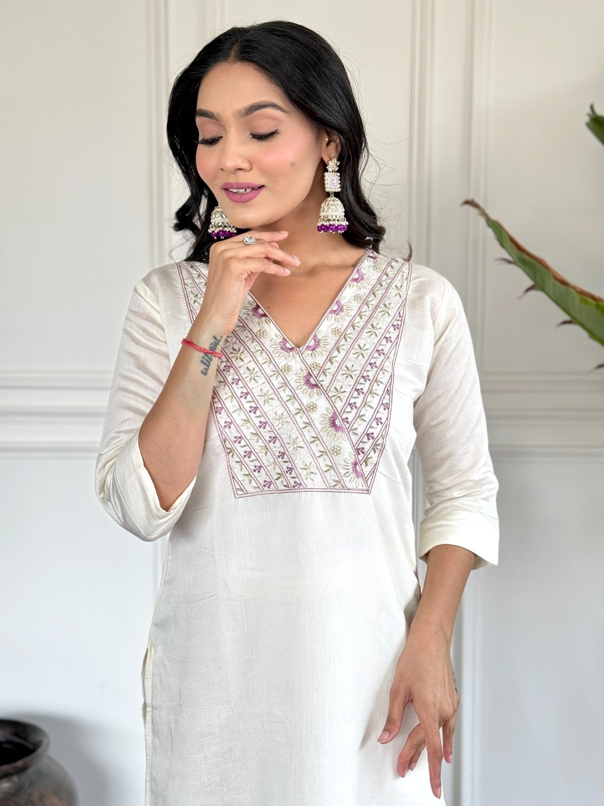 mbrace timeless elegance with this ivory kurti set, featuring delicate embroidery and a soft tie-dye dupatta in pastel hues