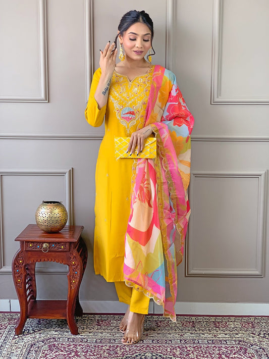 Brighten up your wardrobe with this radiant yellow kurti set, featuring delicate embroidery and a vibrant multicolored dupatta