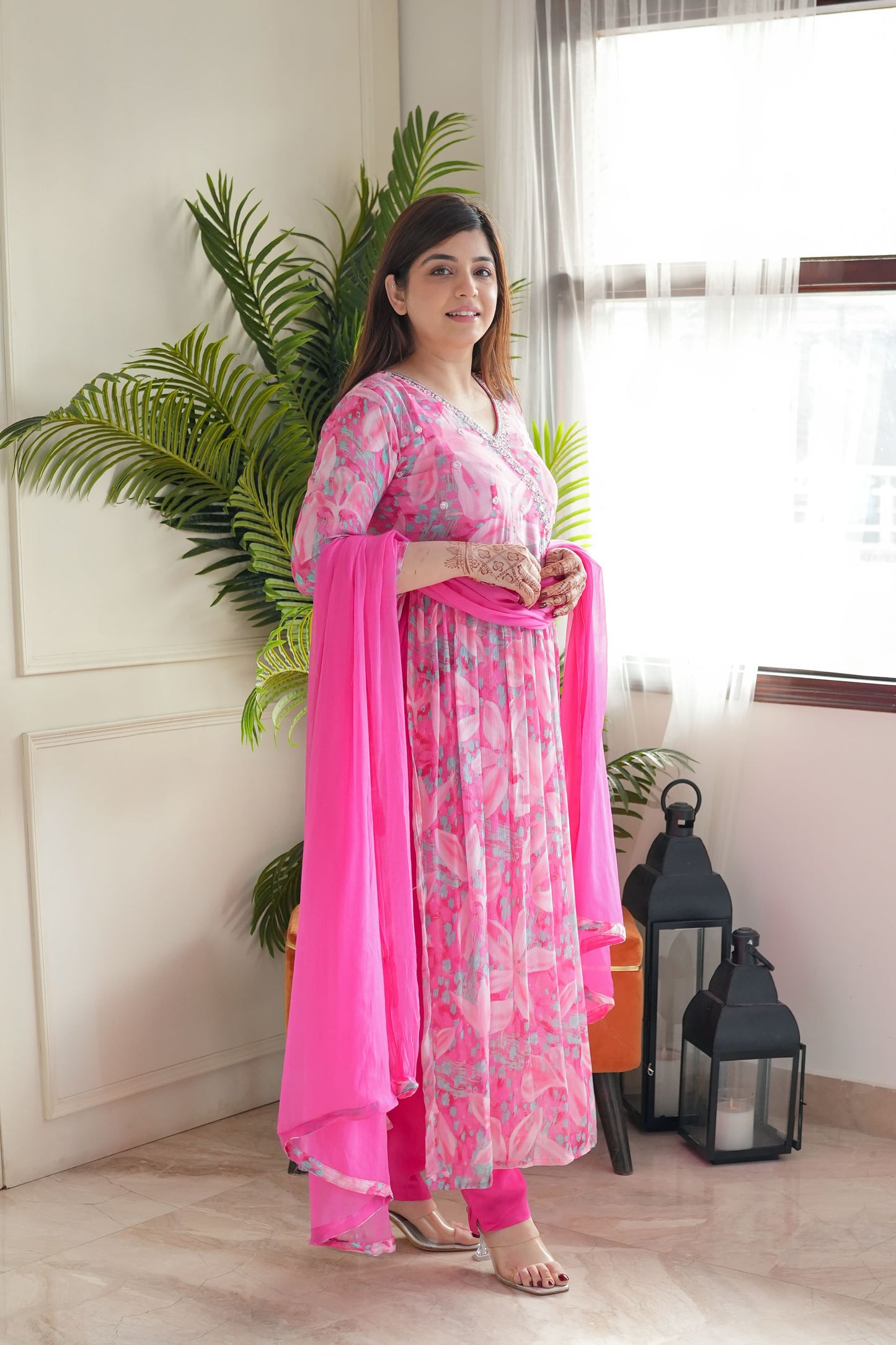Step into elegance with this stunning pink floral kurti set, featuring delicate embroidery and a flowy silhouette