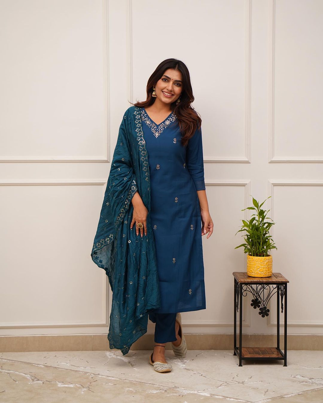 Step into elegance with this stunning deep blue,Yellow and Purpal kurti set, featuring intricate embroidery and a beautifully detailed dupatta