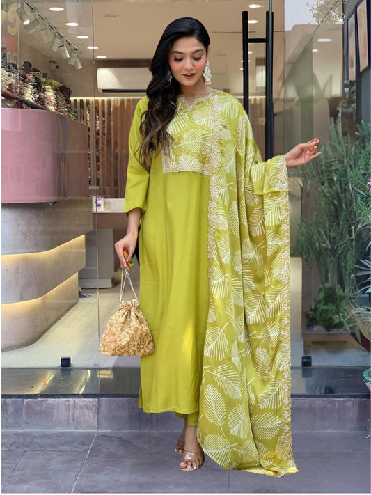 Embrace elegance with this refreshing green kurta set, featuring intricate embroidery and a graceful leaf-patterned dupatta