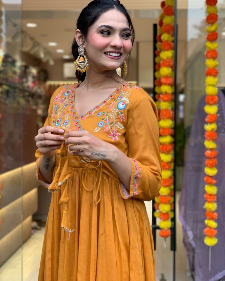 Elevate your ethnic wardrobe with this stunning mustard Anarkali kurta set
