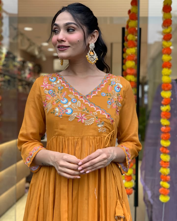 Elevate your ethnic wardrobe with this stunning mustard Anarkali kurta set