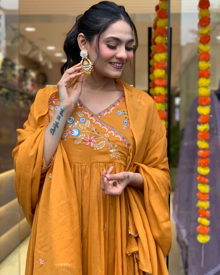 Elevate your ethnic wardrobe with this stunning mustard Anarkali kurta set