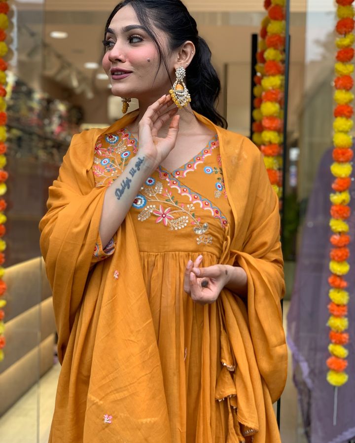 Elevate your ethnic wardrobe with this stunning mustard Anarkali kurta set