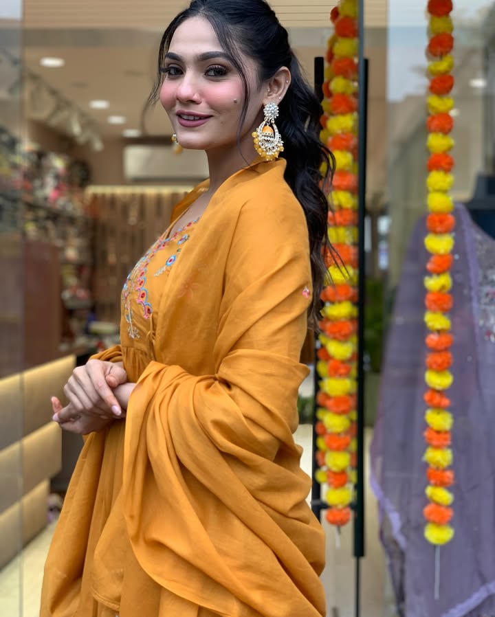 Elevate your ethnic wardrobe with this stunning mustard Anarkali kurta set