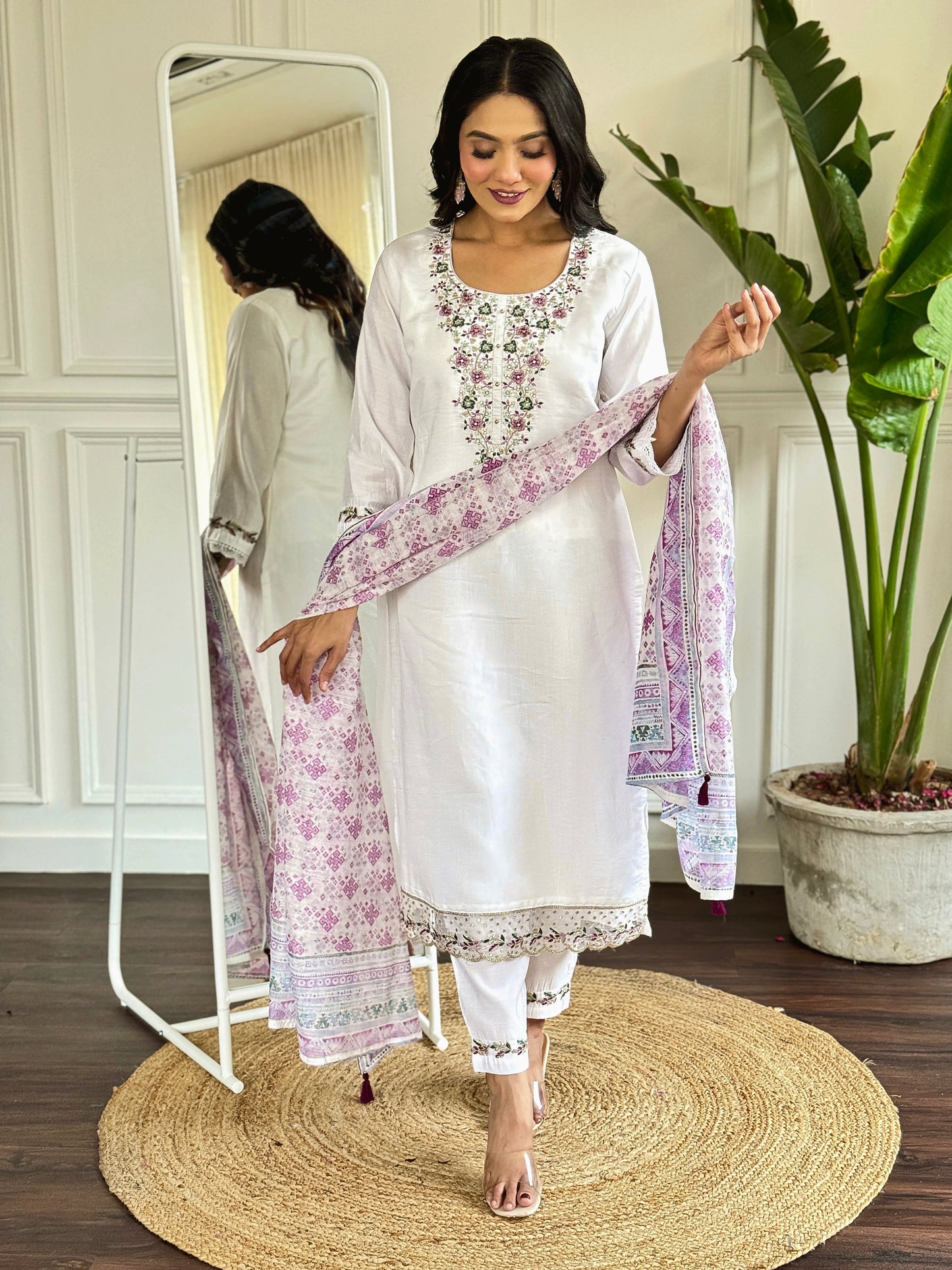 Embrace elegance with this white floral embroidered kurti set, paired with a charming printed dupatta
