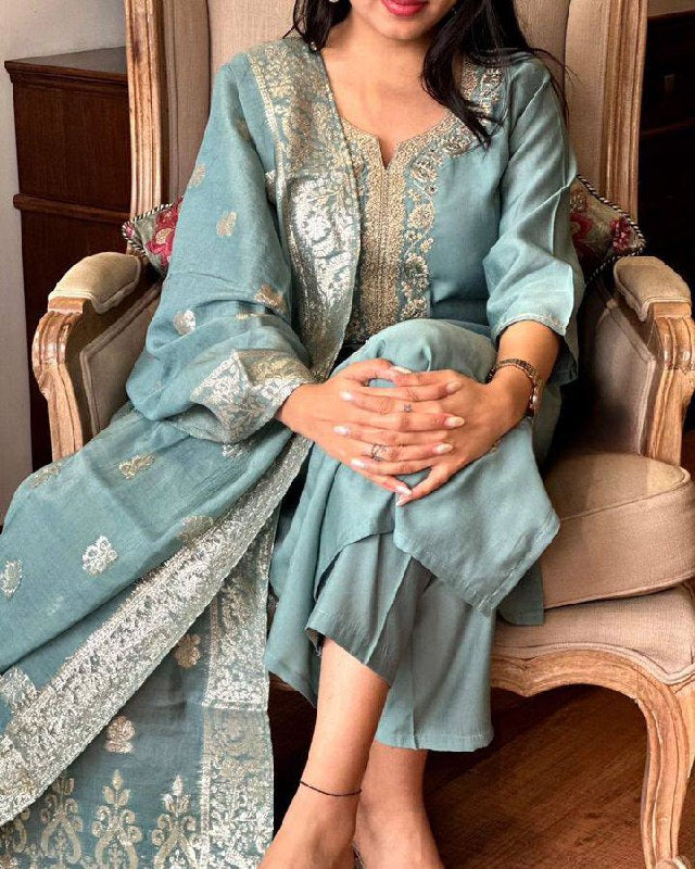 Embrace elegance with this pastel blue Kurti set, featuring exquisite embroidery and a delicately adorned dupatta