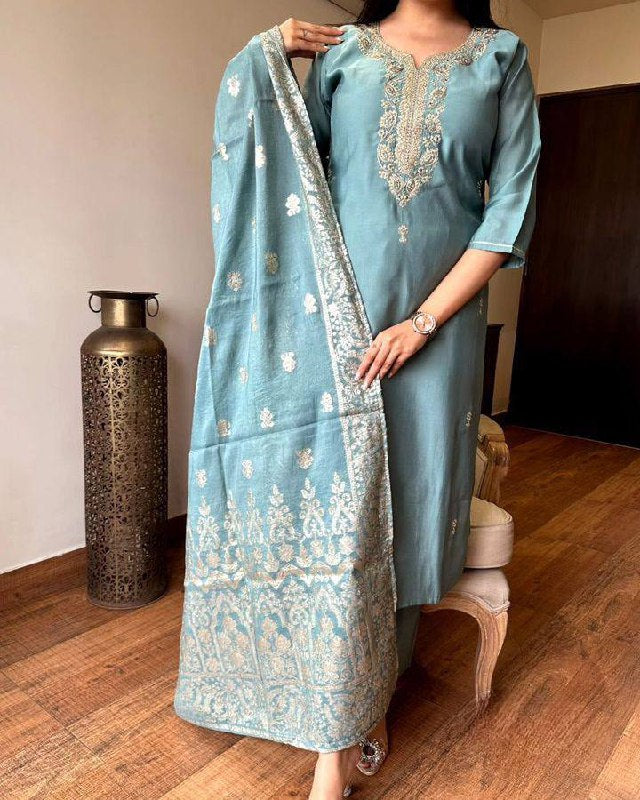 Embrace elegance with this pastel blue Kurti set, featuring exquisite embroidery and a delicately adorned dupatta