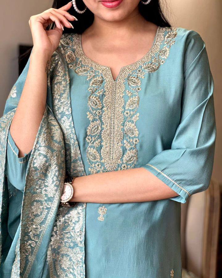 Embrace elegance with this pastel blue Kurti set, featuring exquisite embroidery and a delicately adorned dupatta