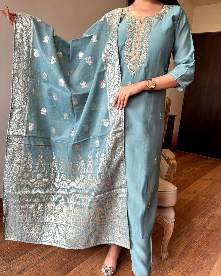Embrace elegance with this pastel blue Kurti set, featuring exquisite embroidery and a delicately adorned dupatta