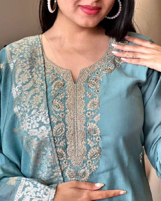 Embrace elegance with this pastel blue Kurti set, featuring exquisite embroidery and a delicately adorned dupatta