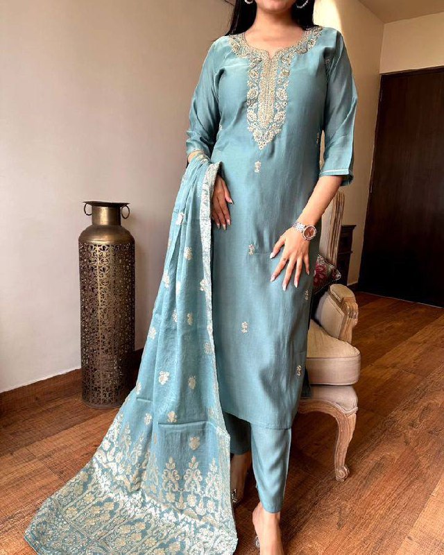 Embrace elegance with this pastel blue Kurti set, featuring exquisite embroidery and a delicately adorned dupatta