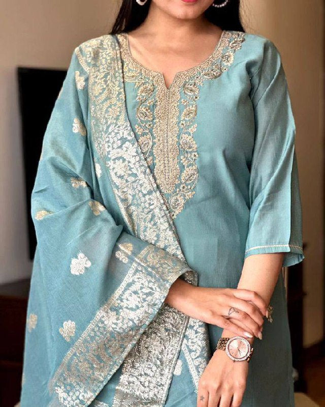 Embrace elegance with this pastel blue Kurti set, featuring exquisite embroidery and a delicately adorned dupatta
