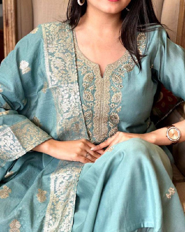 Embrace elegance with this pastel blue Kurti set, featuring exquisite embroidery and a delicately adorned dupatta