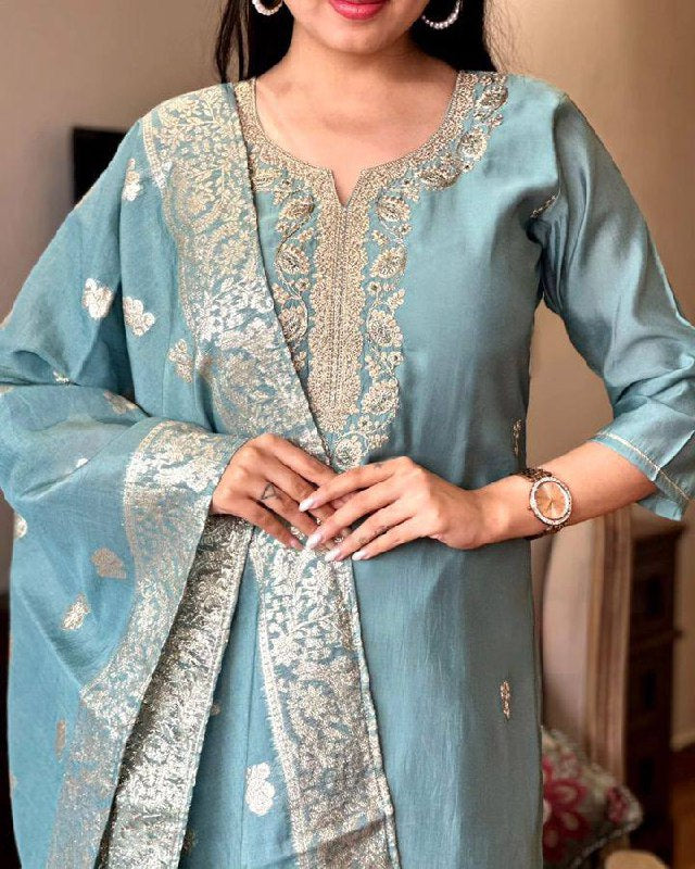 Embrace elegance with this pastel blue Kurti set, featuring exquisite embroidery and a delicately adorned dupatta