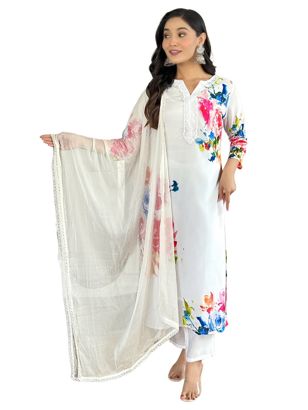 Radiate grace in this stunning white floral Kurti set, adorned with vibrant blossoms and a delicate lace neckline