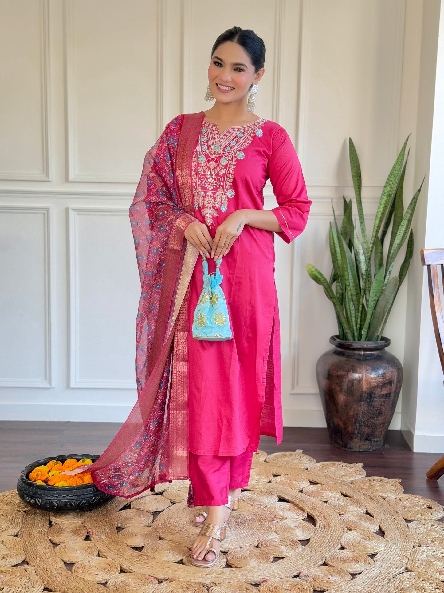 Make a bold statement with this vibrant pink Kurti set, adorned with intricate embroidery and a beautifully detailed dupatta