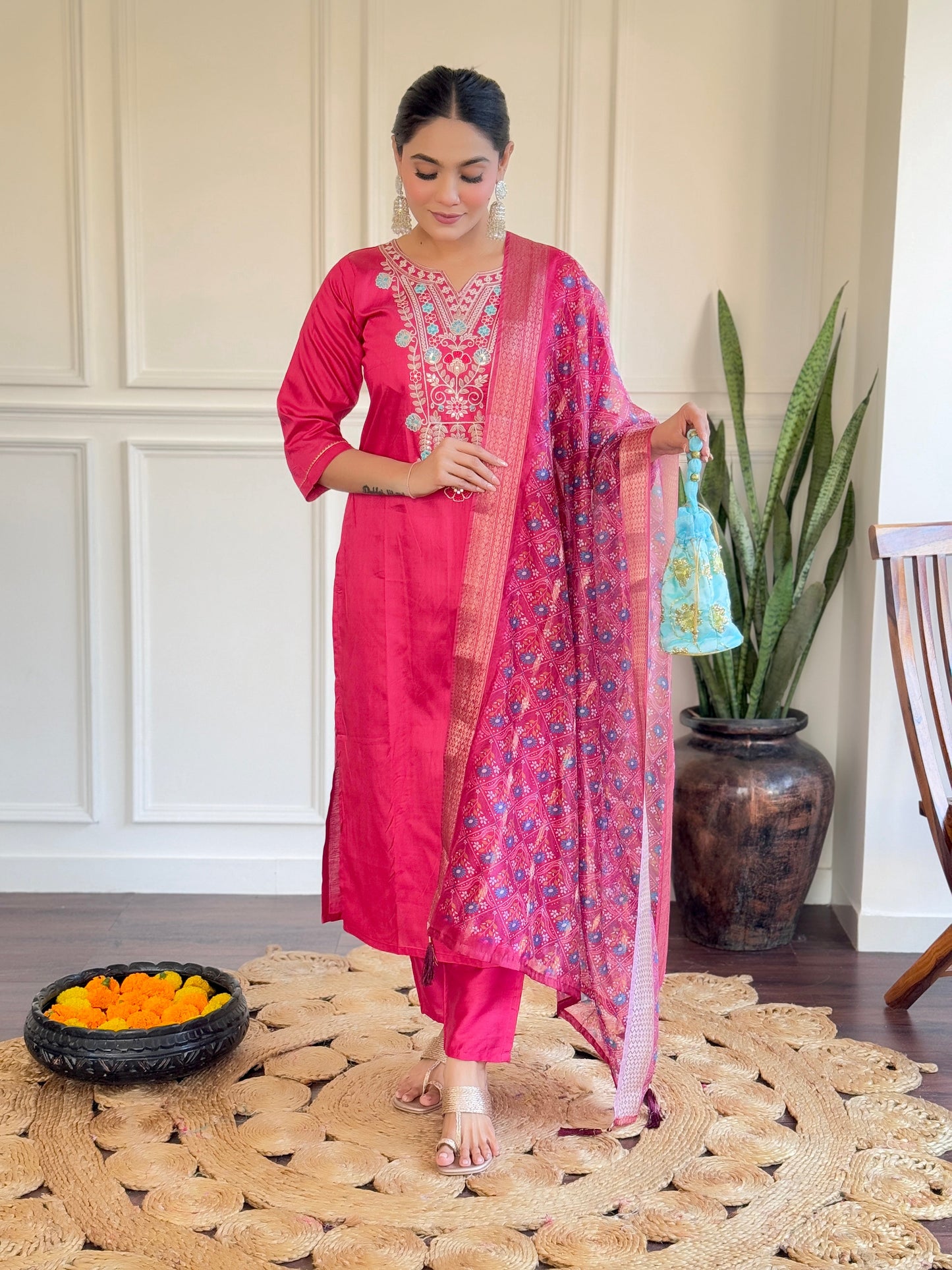 Make a bold statement with this vibrant pink Kurti set, adorned with intricate embroidery and a beautifully detailed dupatta