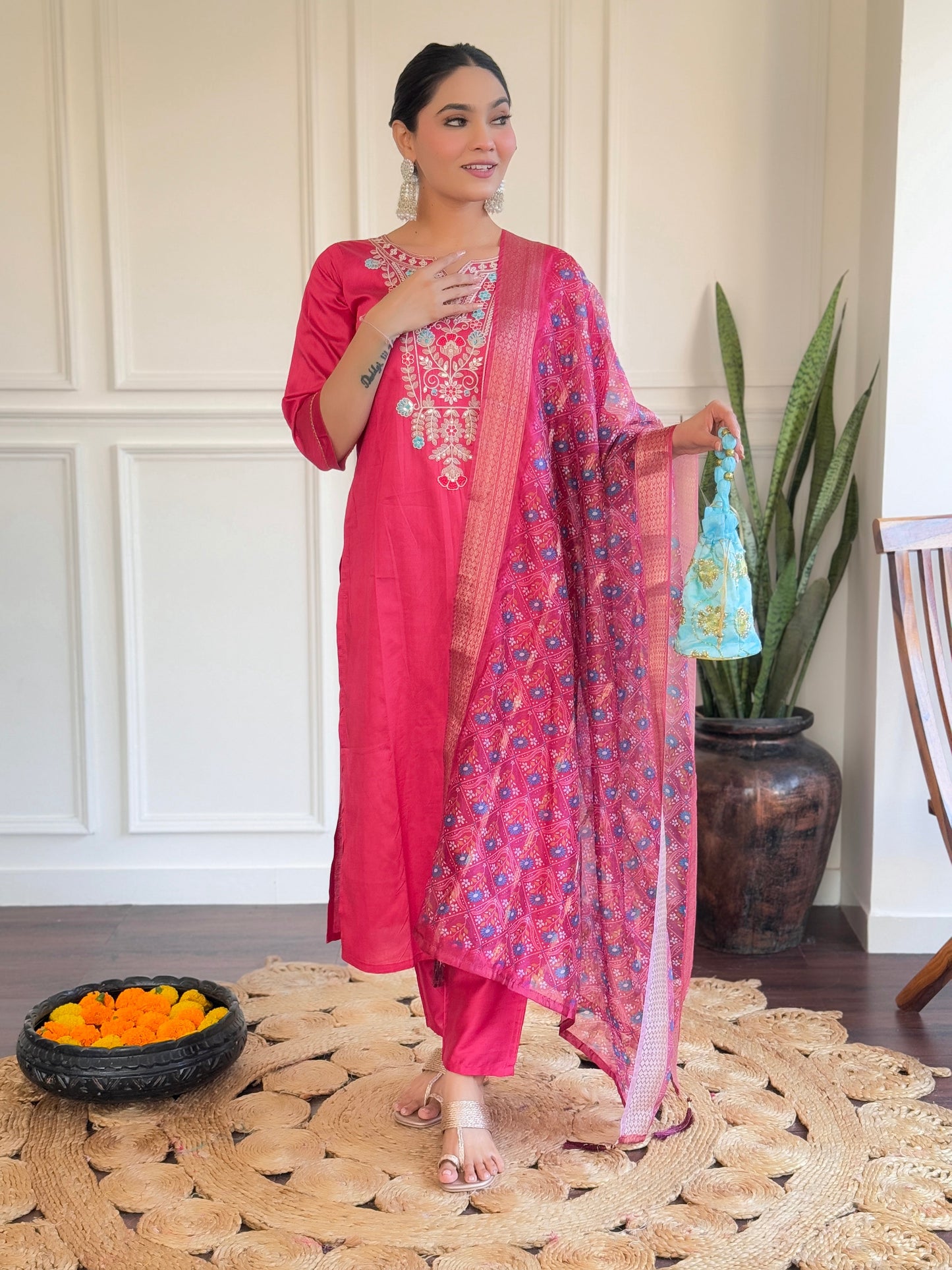 Make a bold statement with this vibrant pink Kurti set, adorned with intricate embroidery and a beautifully detailed dupatta