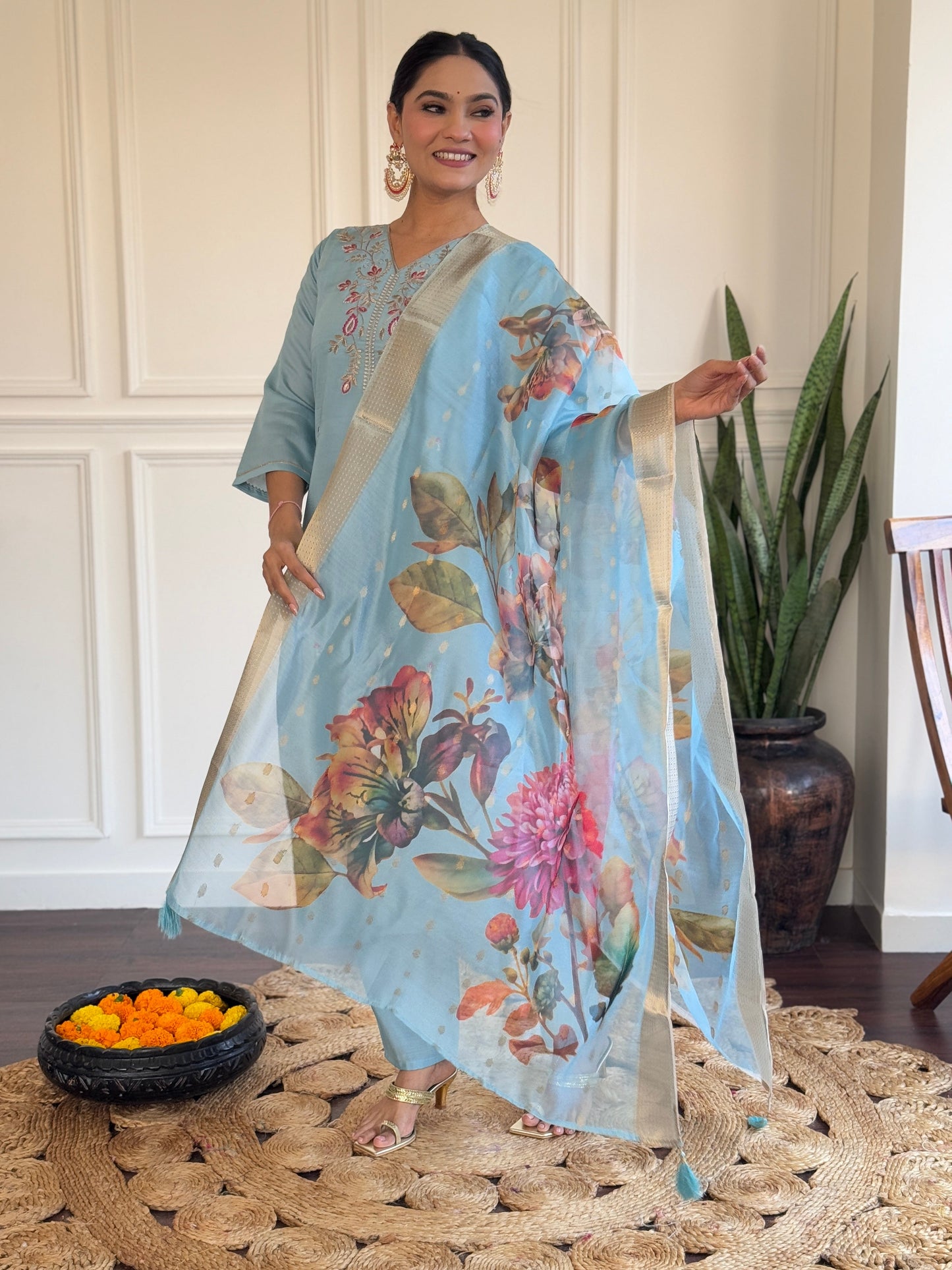 Step into elegance with this pastel blue Kurti set, featuring delicate embroidery and a beautifully printed dupatta