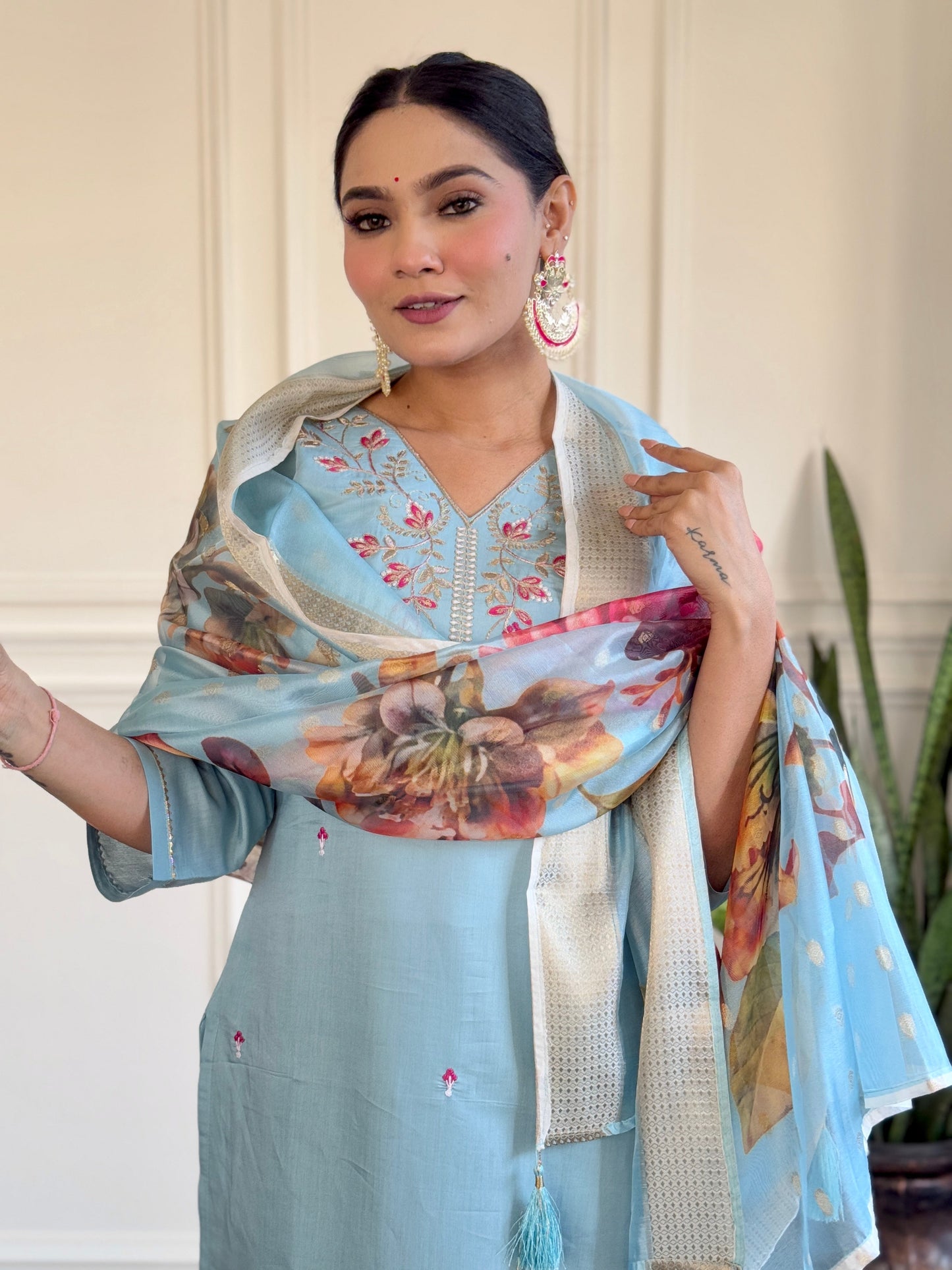 Step into elegance with this pastel blue Kurti set, featuring delicate embroidery and a beautifully printed dupatta