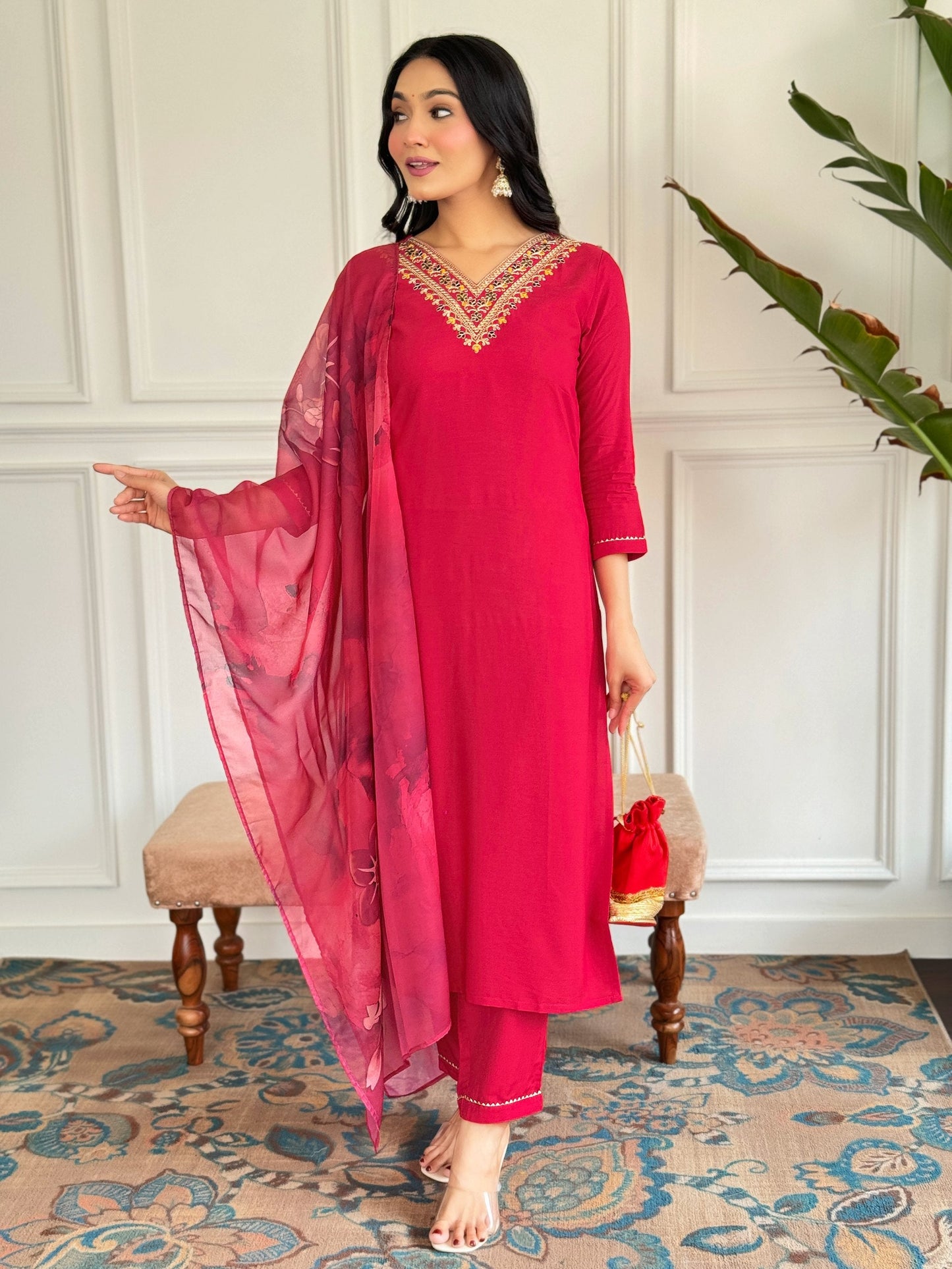 Add a touch of elegance with this stunning red Kurti set, featuring intricate neckline embroidery and a floral printed dupatta