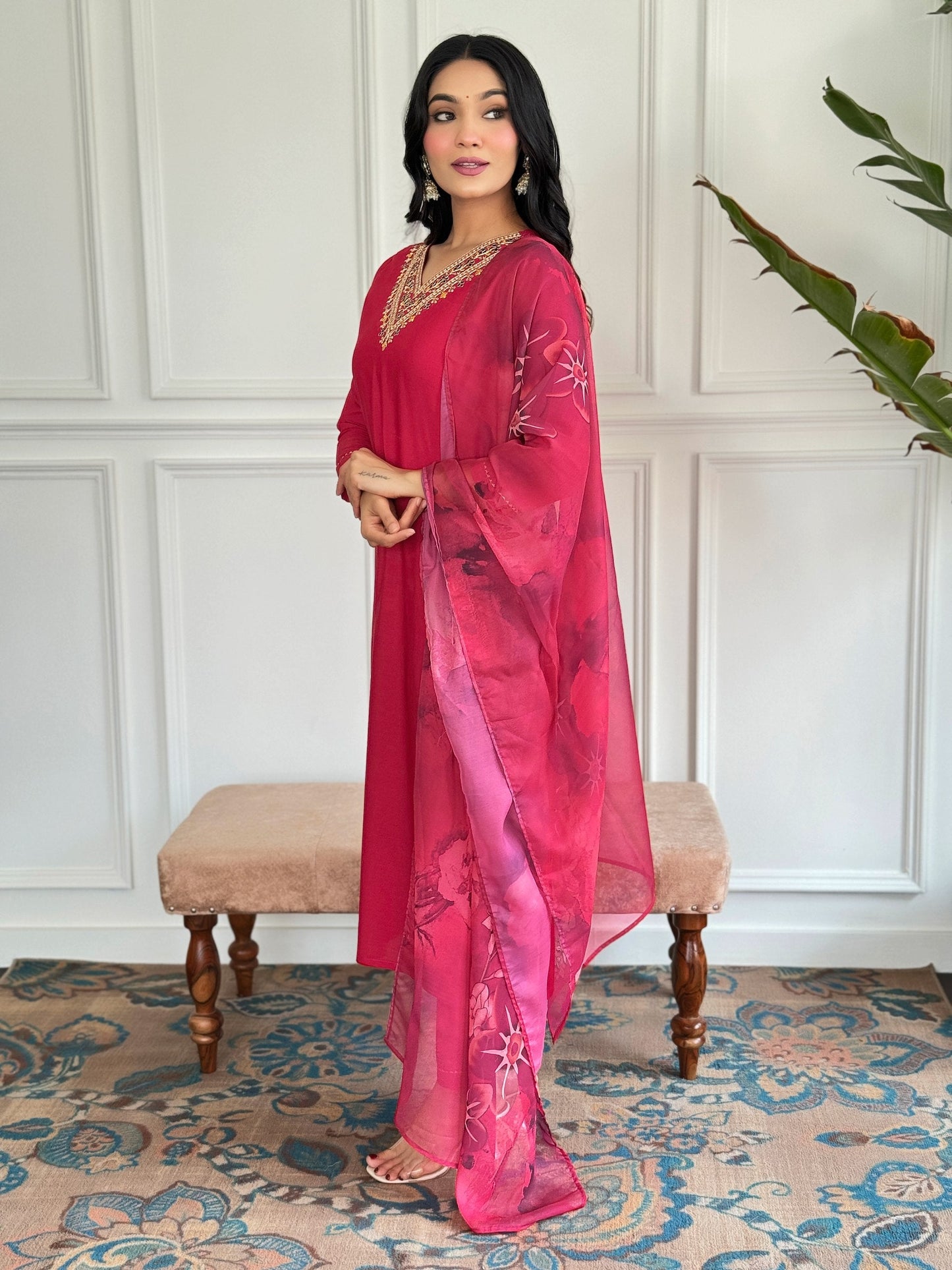 Add a touch of elegance with this stunning red Kurti set, featuring intricate neckline embroidery and a floral printed dupatta