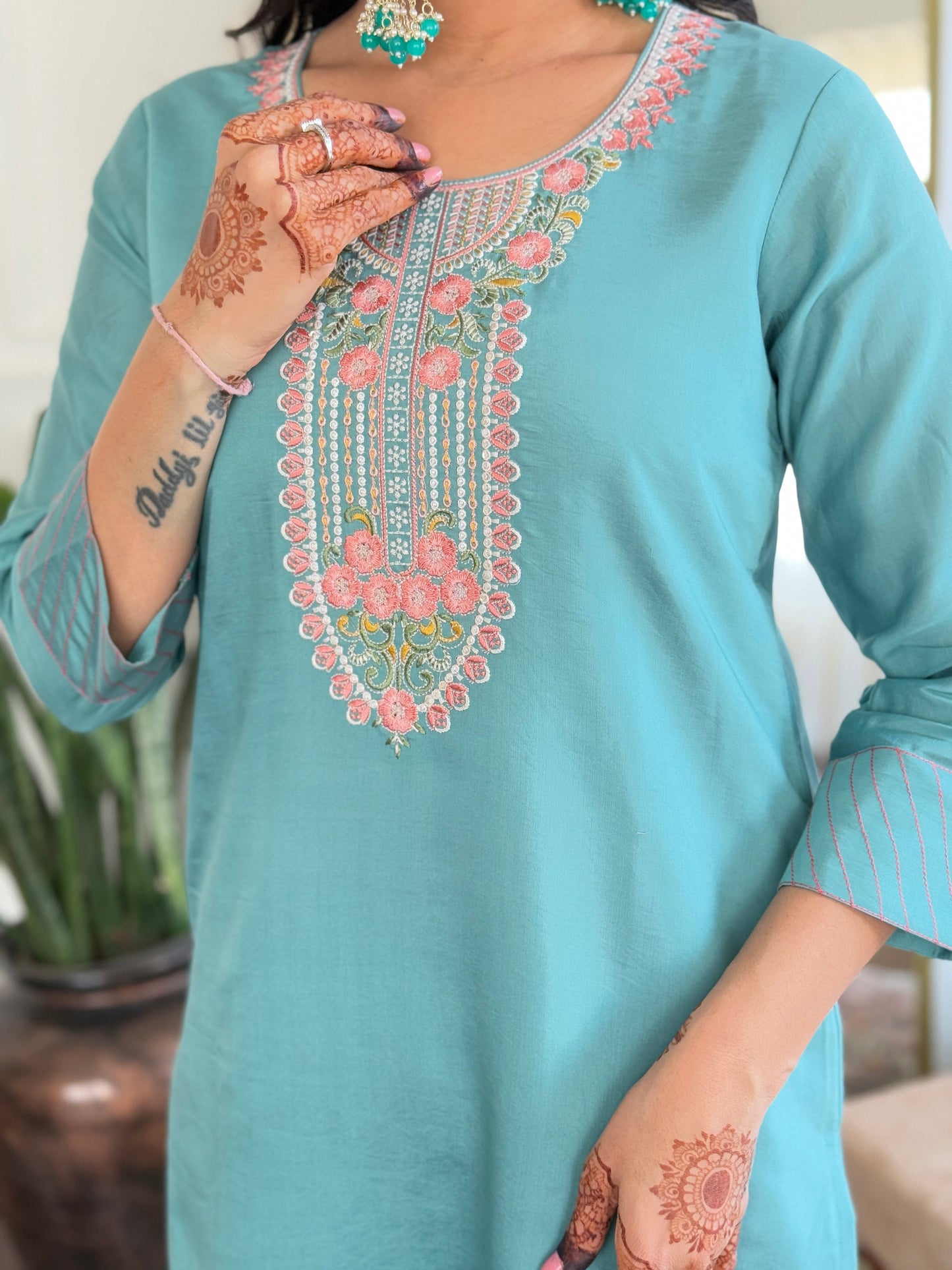 Elevate your wardrobe with this elegant teal kurti set, adorned with delicate embroidery and a matching dupatta for a refined look