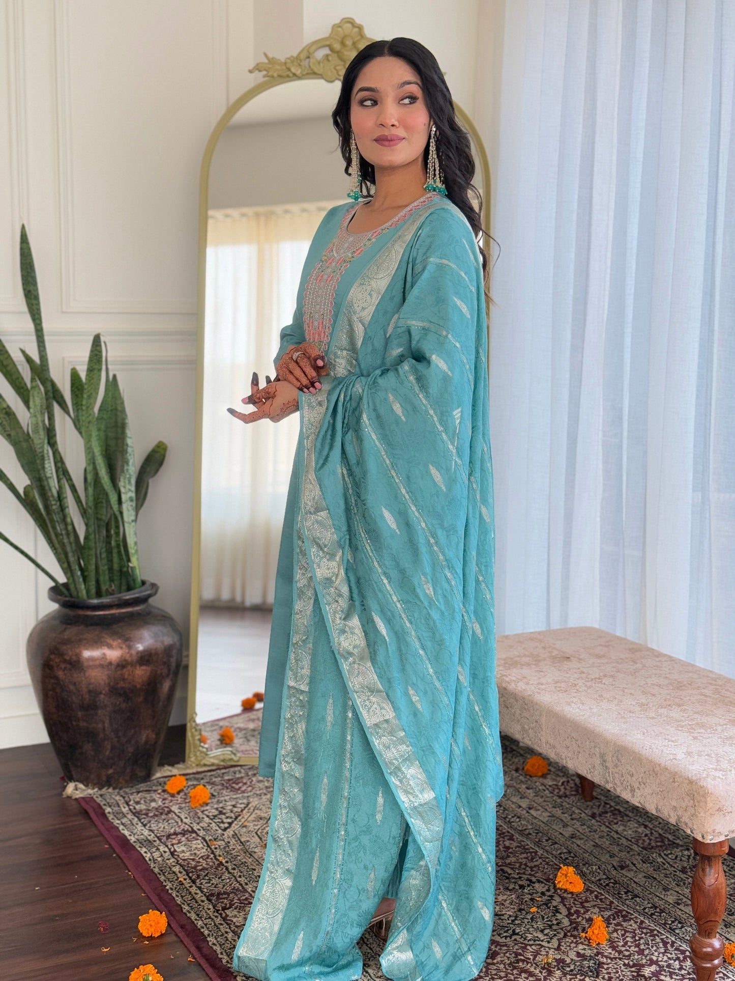 Elevate your wardrobe with this elegant teal kurti set, adorned with delicate embroidery and a matching dupatta for a refined look
