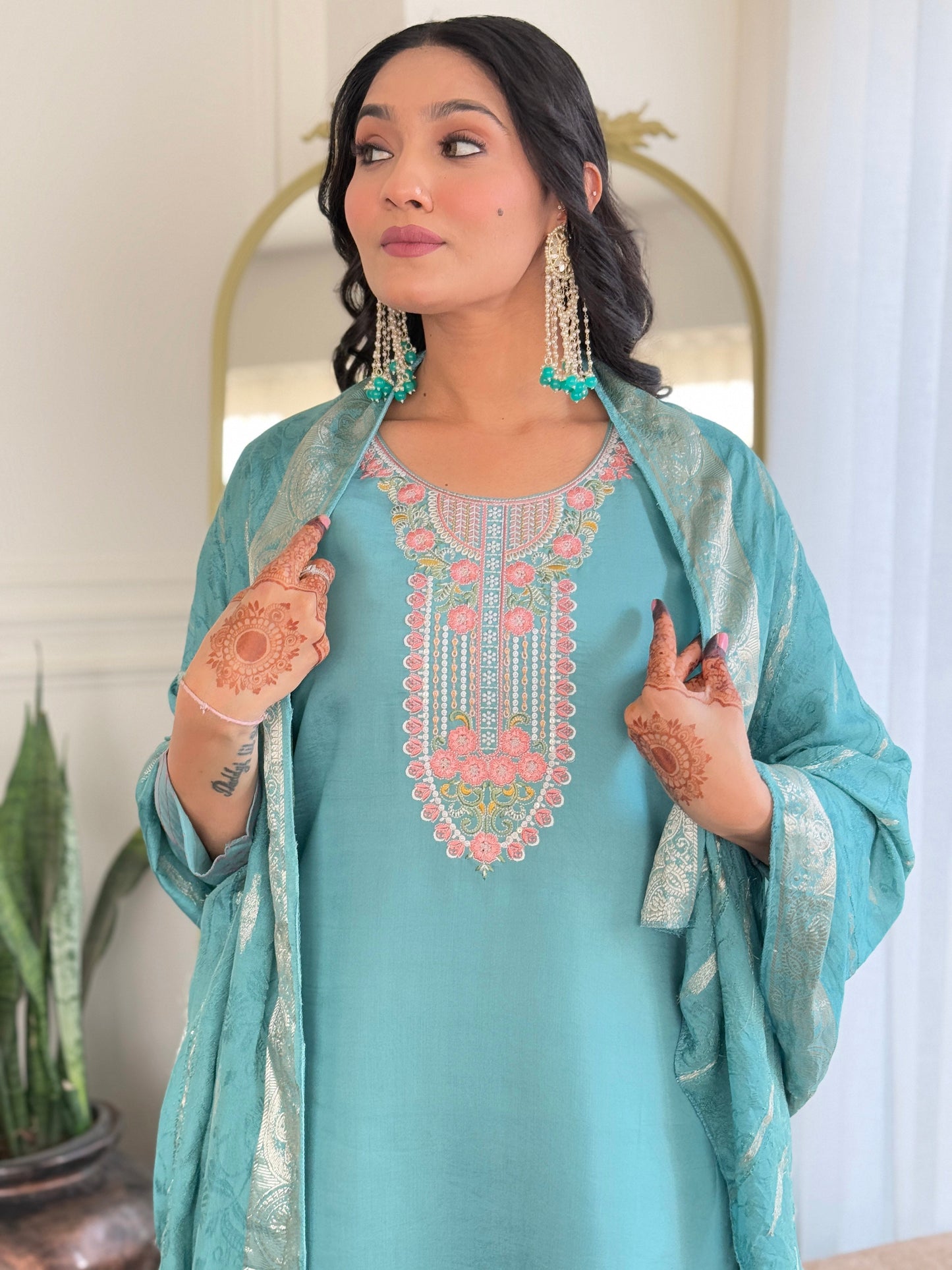 Elevate your wardrobe with this elegant teal kurti set, adorned with delicate embroidery and a matching dupatta for a refined look