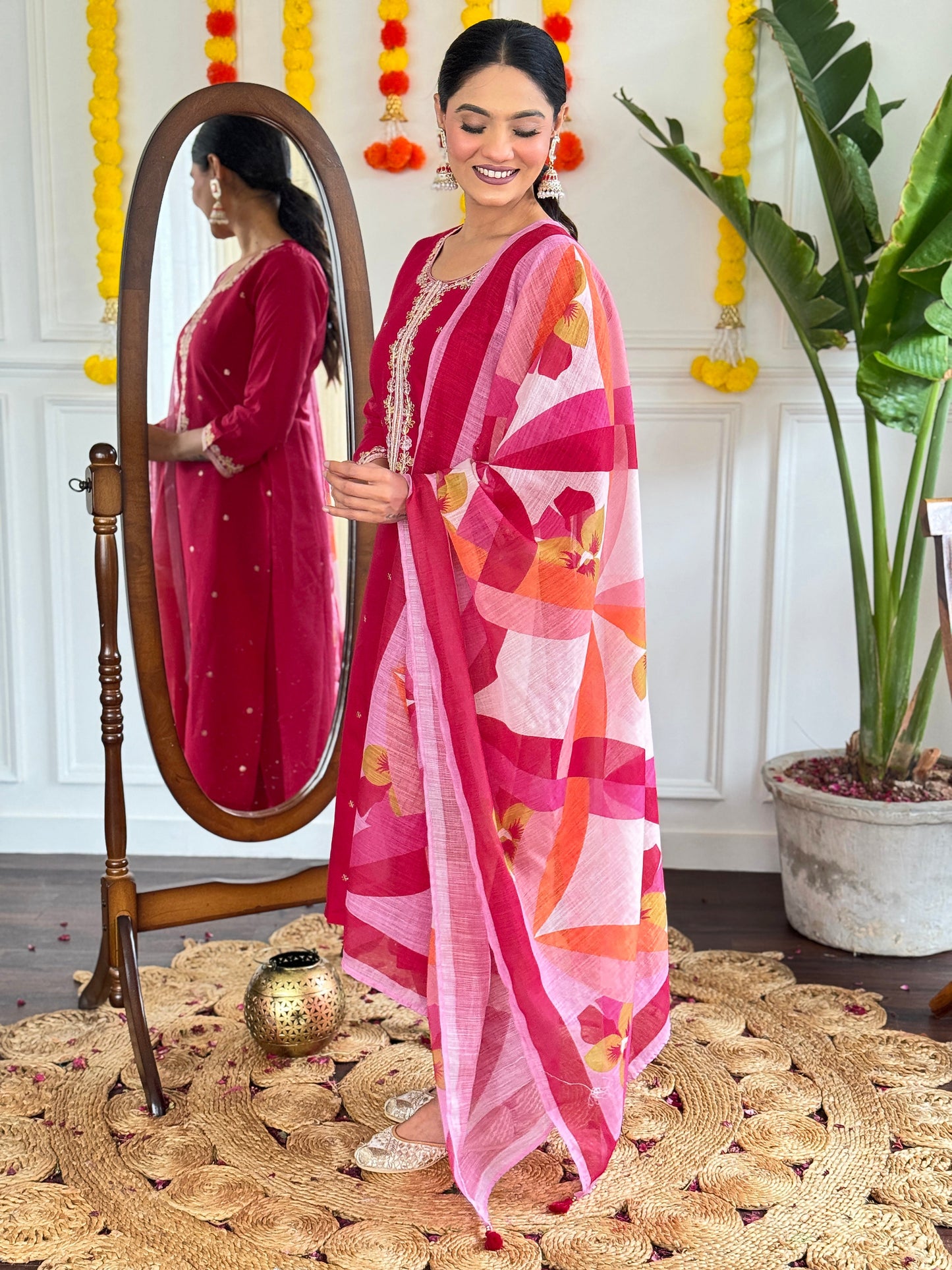 Radiate elegance with this stunning pink kurti set, adorned with delicate embroidery and paired with a vibrant printed dupatta
