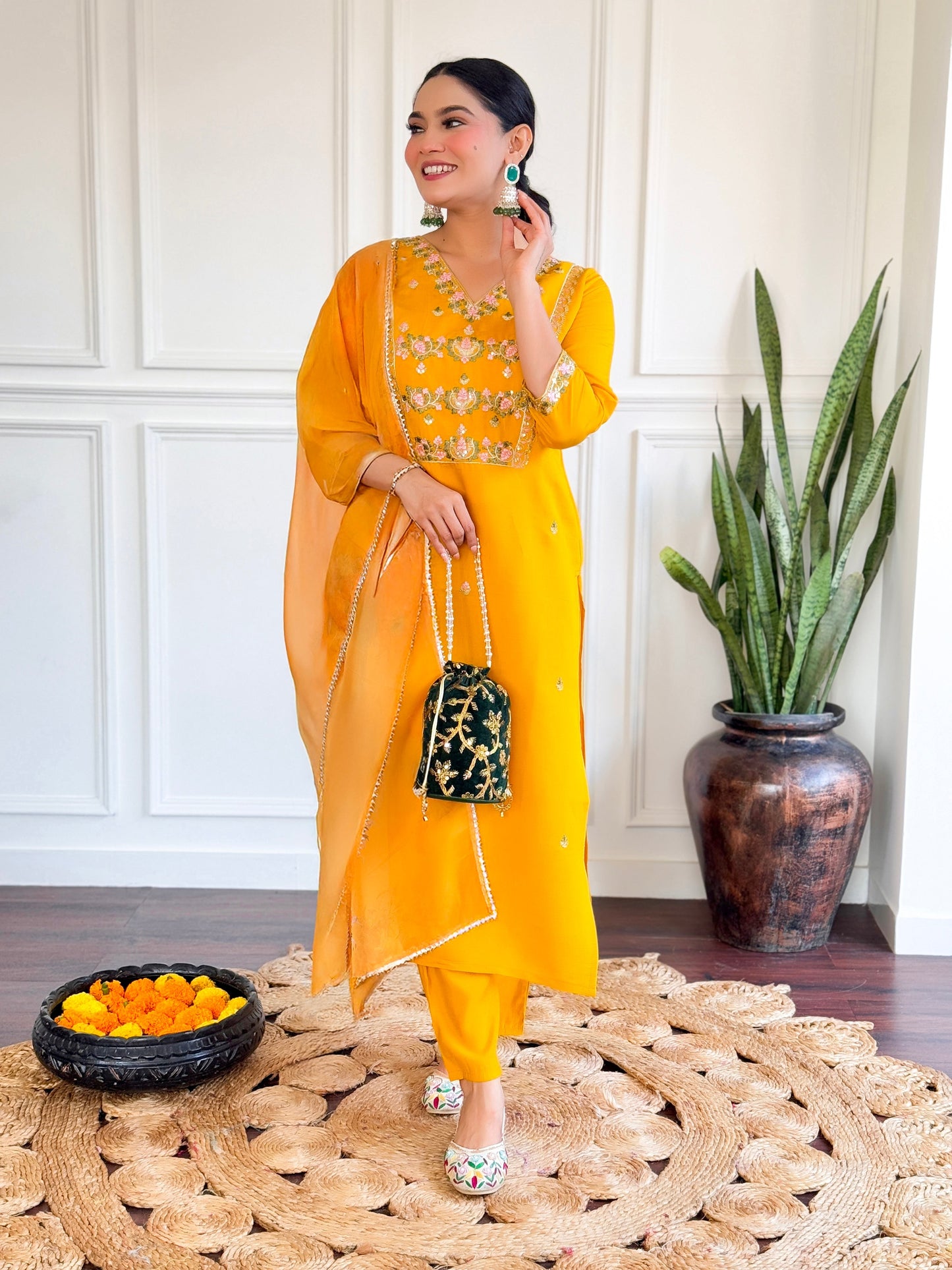 Brighten up your wardrobe with this stunning yellow kurti set, adorned with intricate floral embroidery and a graceful dupatt