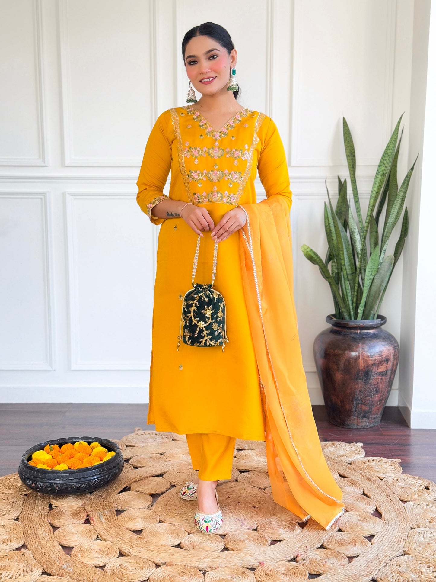 Brighten up your wardrobe with this stunning yellow kurti set, adorned with intricate floral embroidery and a graceful dupatt