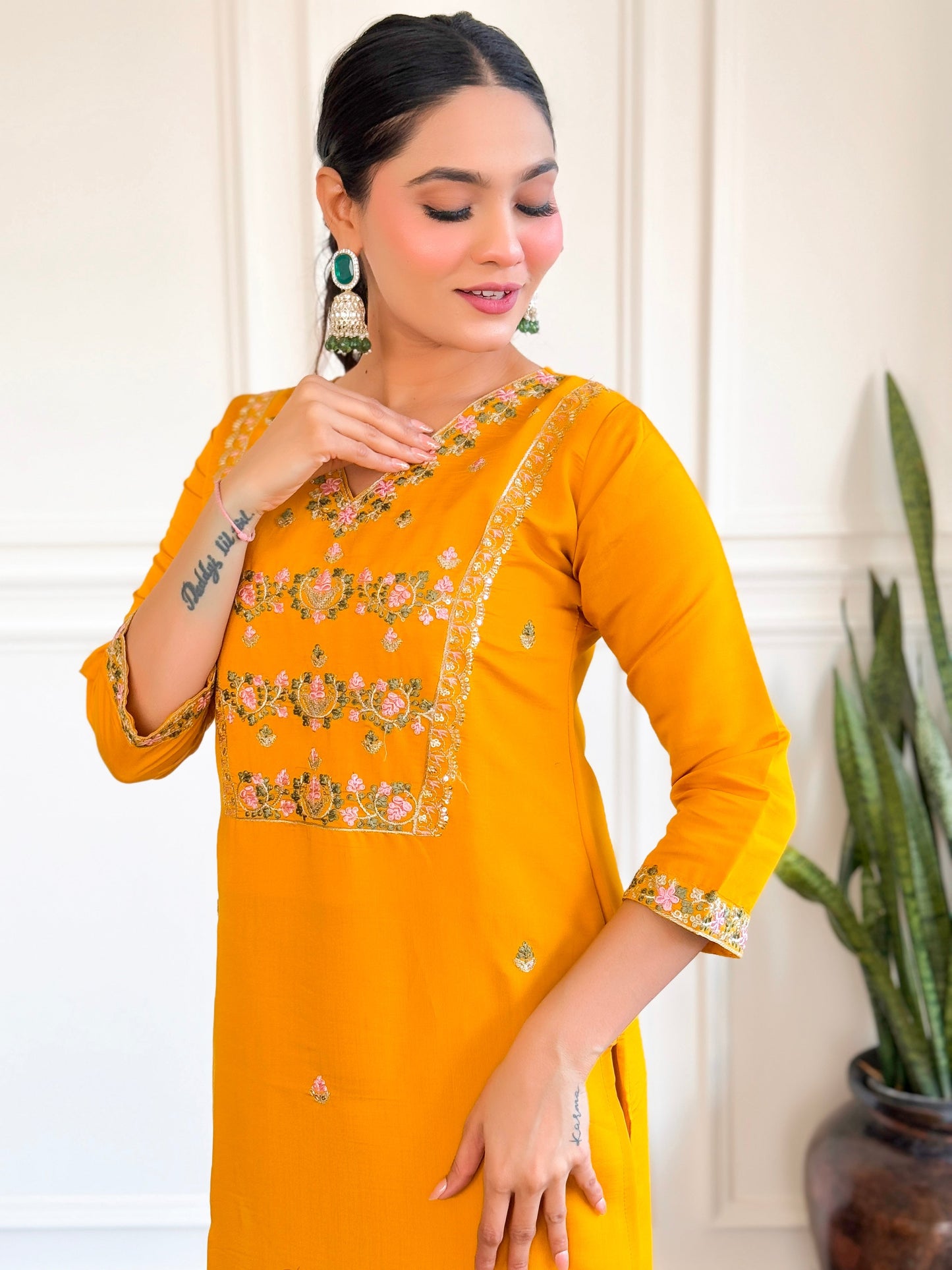 Brighten up your wardrobe with this stunning yellow kurti set, adorned with intricate floral embroidery and a graceful dupatt