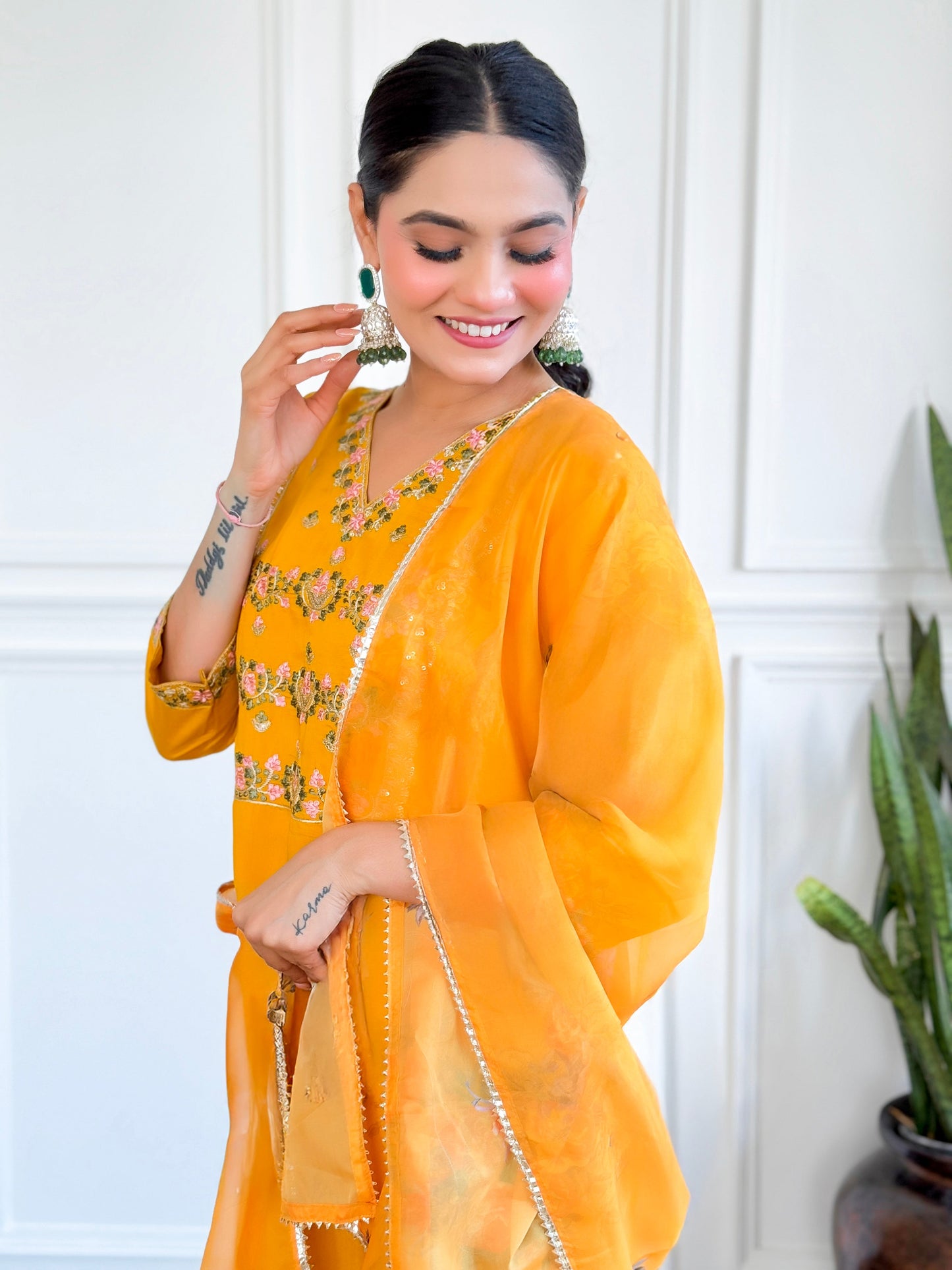 Brighten up your wardrobe with this stunning yellow kurti set, adorned with intricate floral embroidery and a graceful dupatt