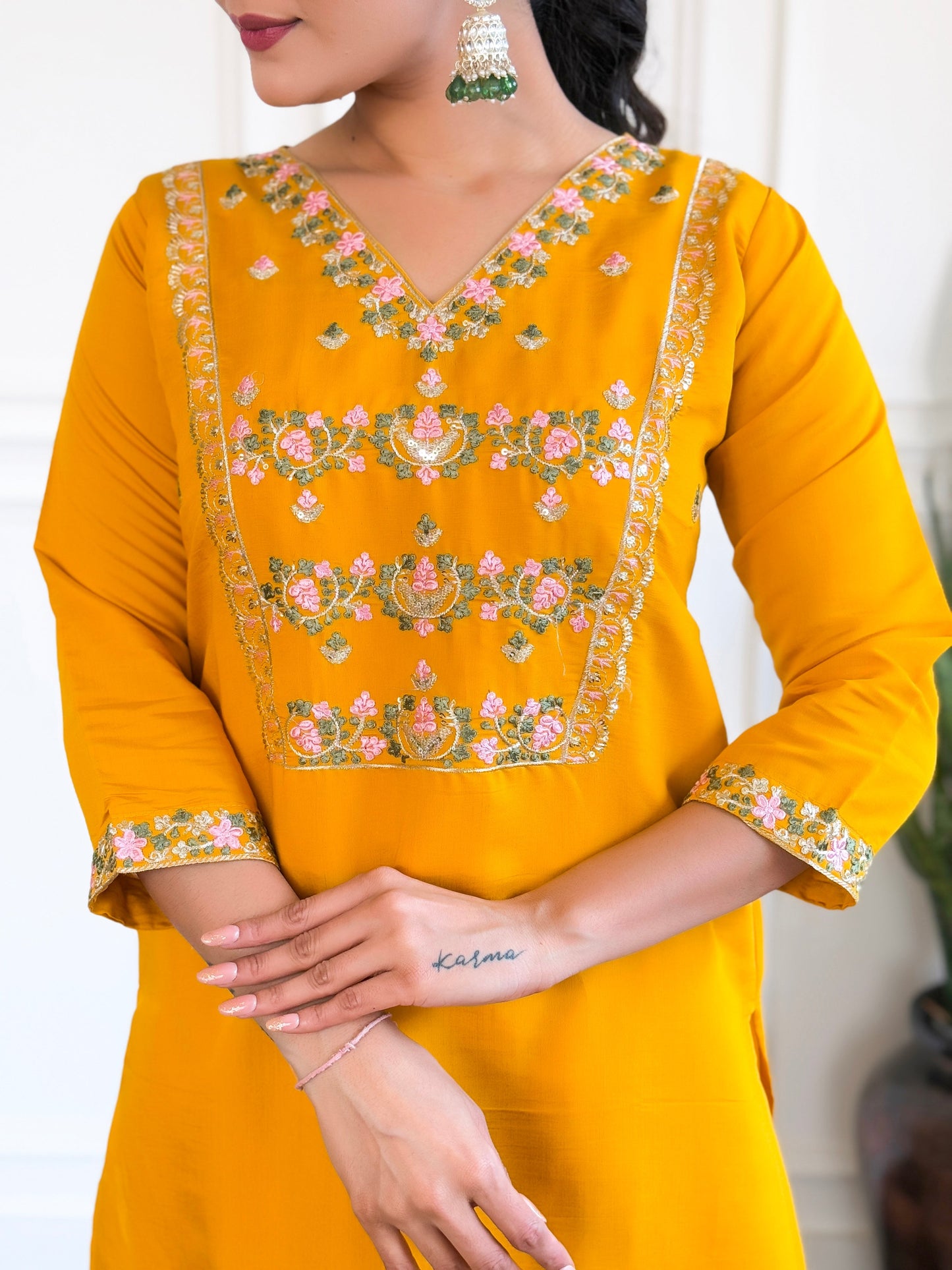Brighten up your wardrobe with this stunning yellow kurti set, adorned with intricate floral embroidery and a graceful dupatt