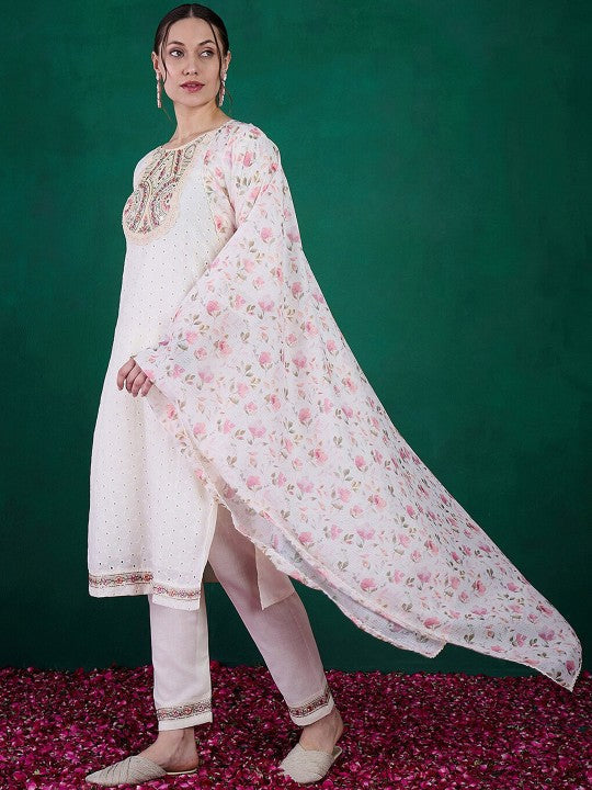 Embrace elegance with this exquisite white kurti set, featuring delicate mirror work, intricate embroidery, and a floral-printed dupatta